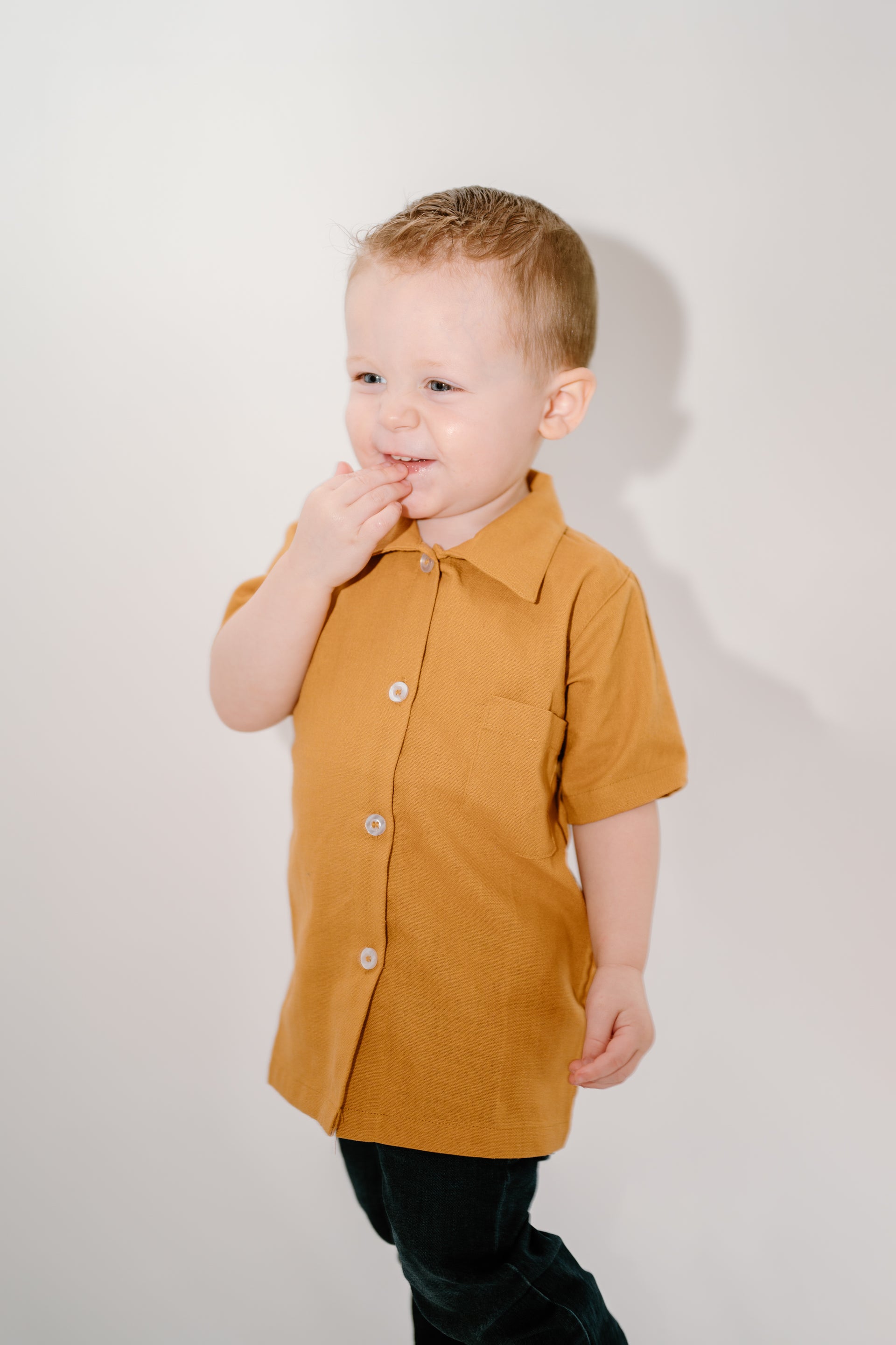 Boy wearing Everett Shirt in mustard